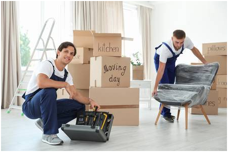 Professional San Diego movers carefully preparing furniture